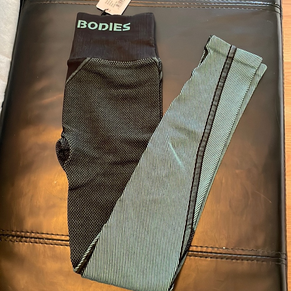 BETTER BODIES Black and Striped Green Leggings